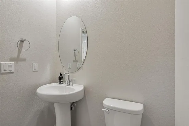 a white bath tub sitting next to a window
