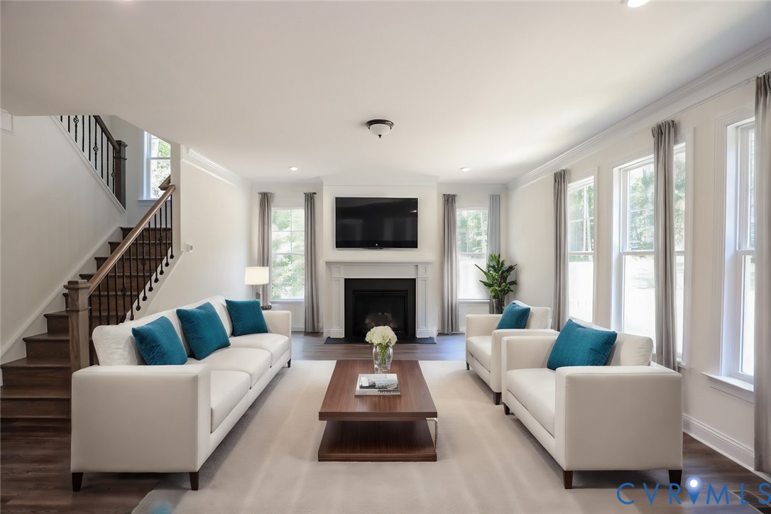 4660 McGhee House Road Mechanicsville, VA 23111 - Photo 13 of 48 a living room with furniture fireplace and a large window