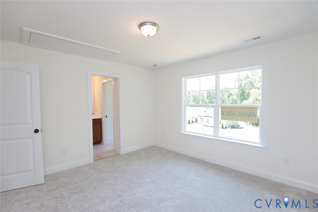 4660 McGhee House Road Mechanicsville, VA 23111 - Photo 31 of 48 a view of an empty room with a window