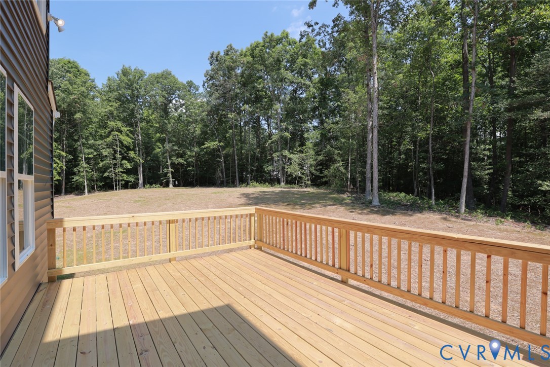4660 McGhee House Road Mechanicsville, VA 23111 - Photo 40 of 48 a view of deck with trees