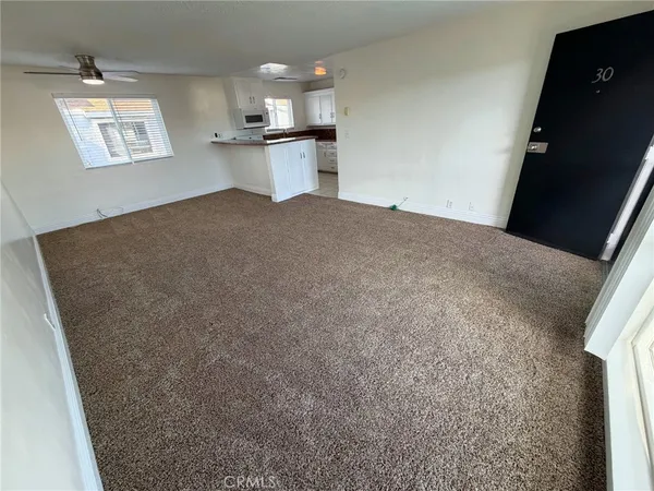 a view of a bedroom and window