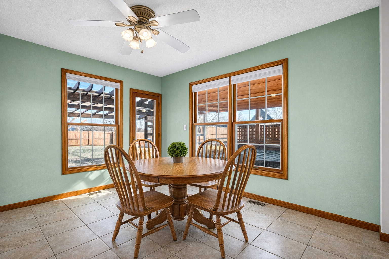 1829 Derek Drive Normal, IL 61761 - Photo 15 of 37 a dining room with furniture a chandelier and window