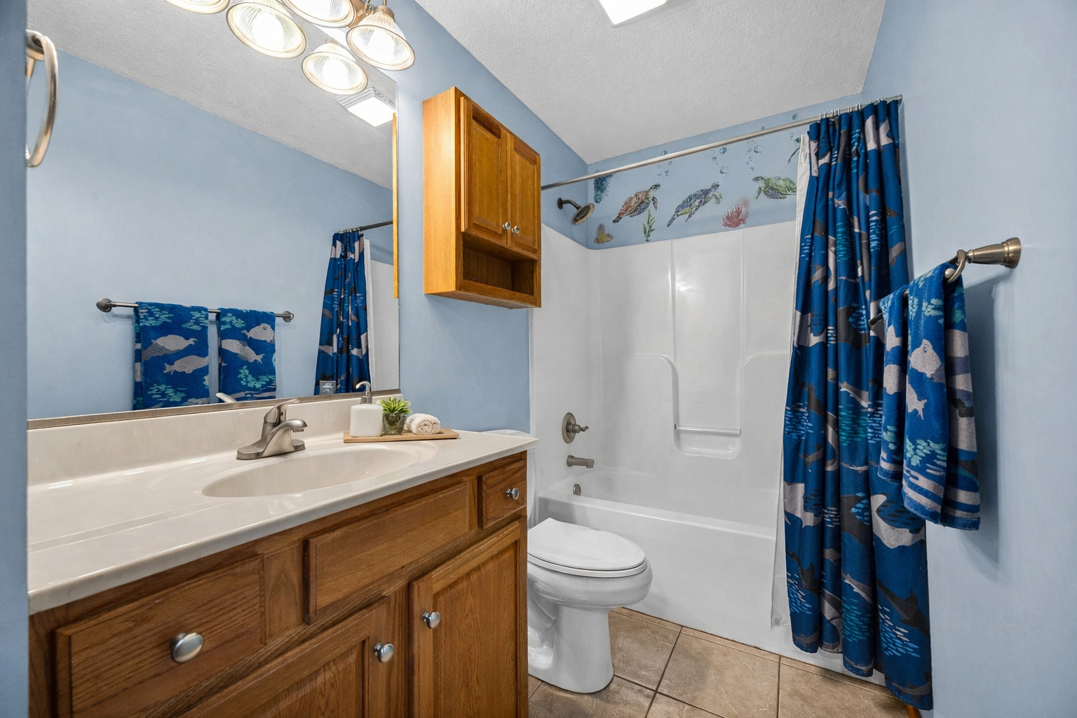 1829 Derek Drive Normal, IL 61761 - Photo 17 of 37 a bathroom with a sink toilet and shower