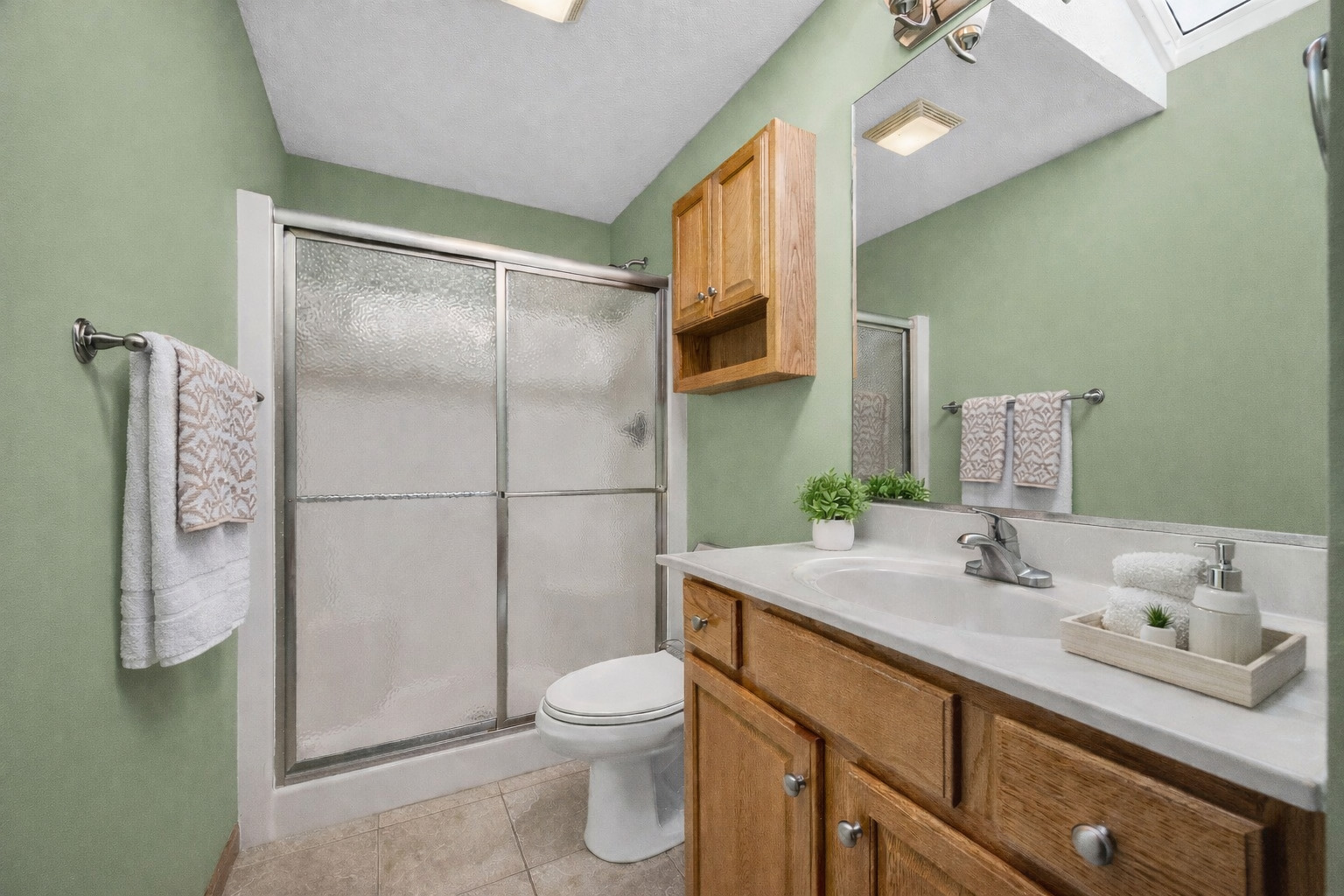 1829 Derek Drive Normal, IL 61761 - Photo 20 of 37 a bathroom with a sink toilet and shower