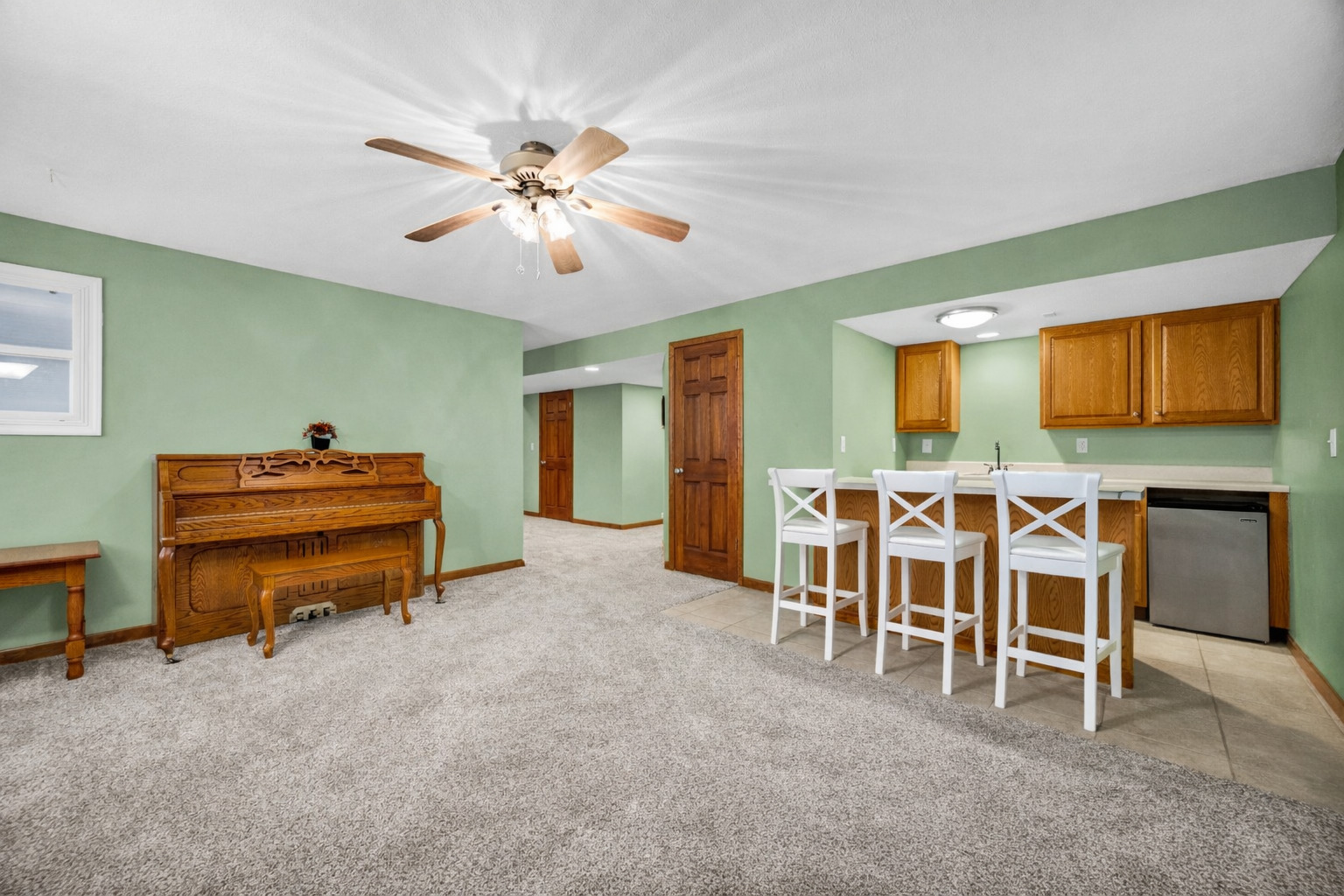 1829 Derek Drive Normal, IL 61761 - Photo 25 of 37 a room with furniture and a flat screen tv