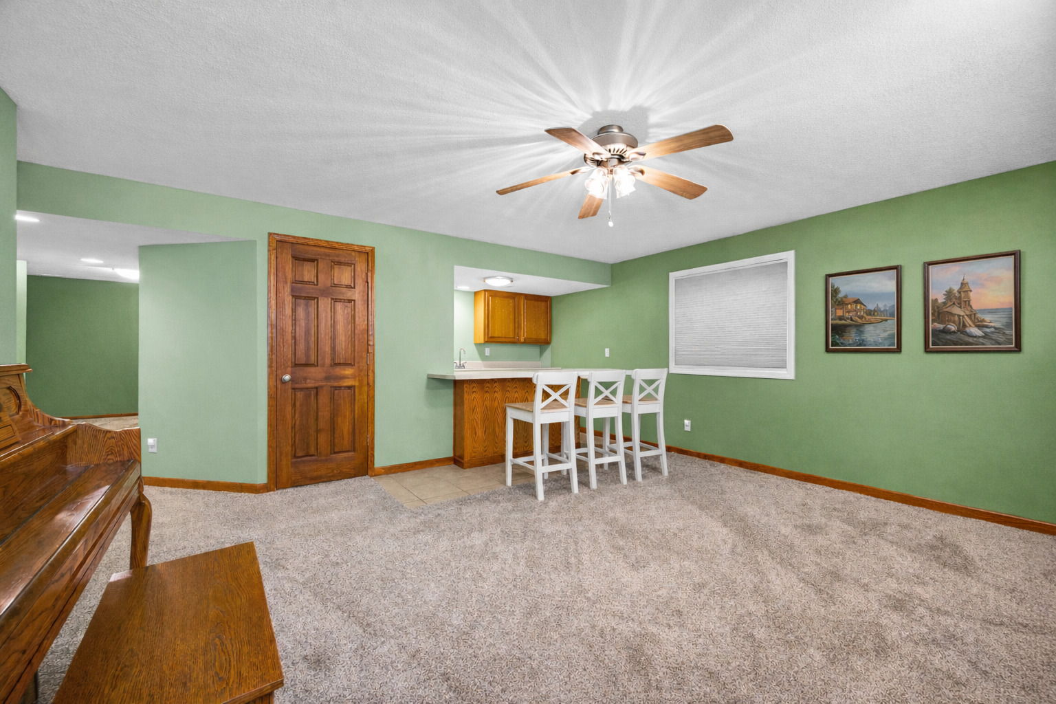 1829 Derek Drive Normal, IL 61761 - Photo 26 of 37 a view of a livingroom with furniture and a flat screen tv