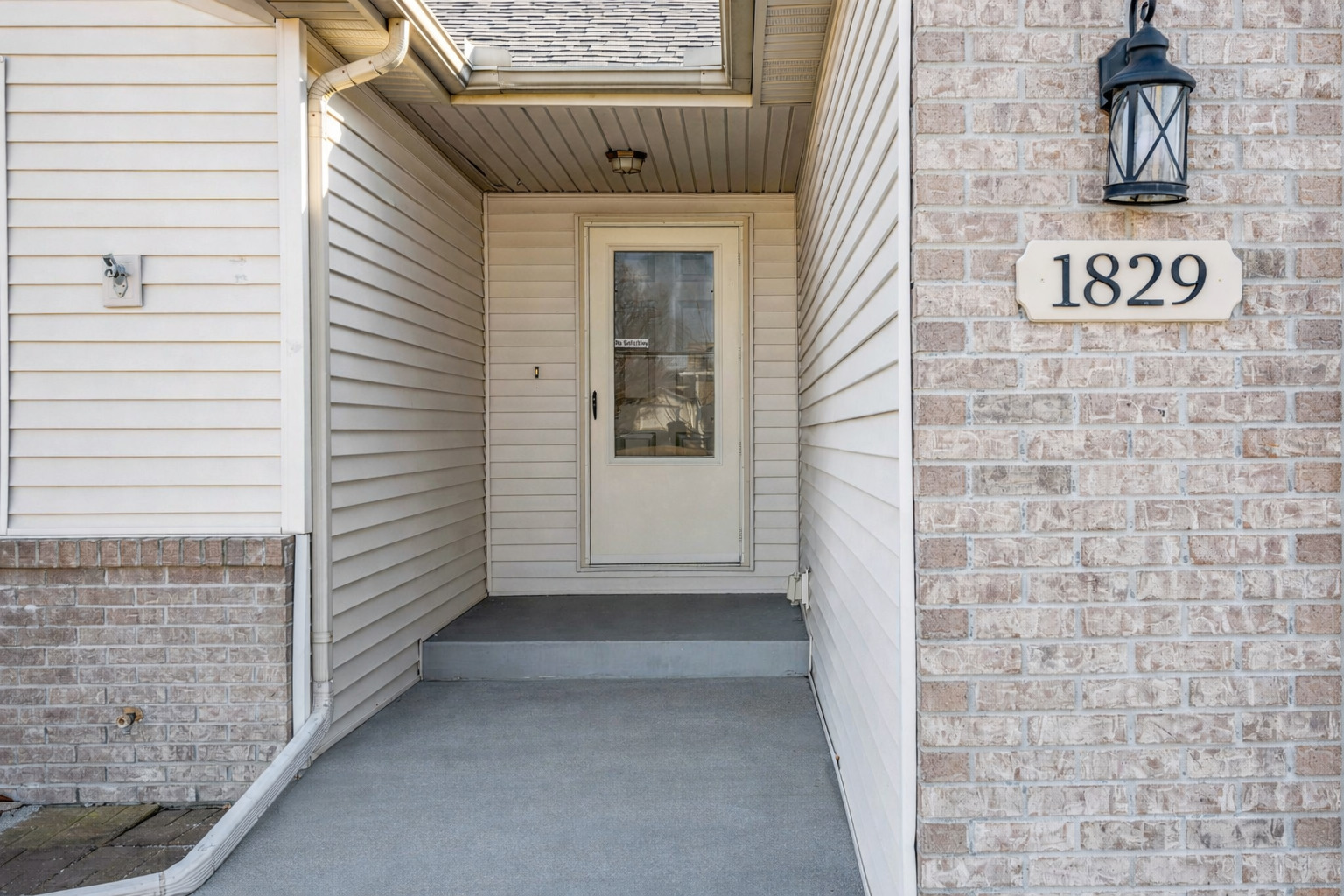 1829 Derek Drive Normal, IL 61761 - Photo 3 of 37 a view of front door of house