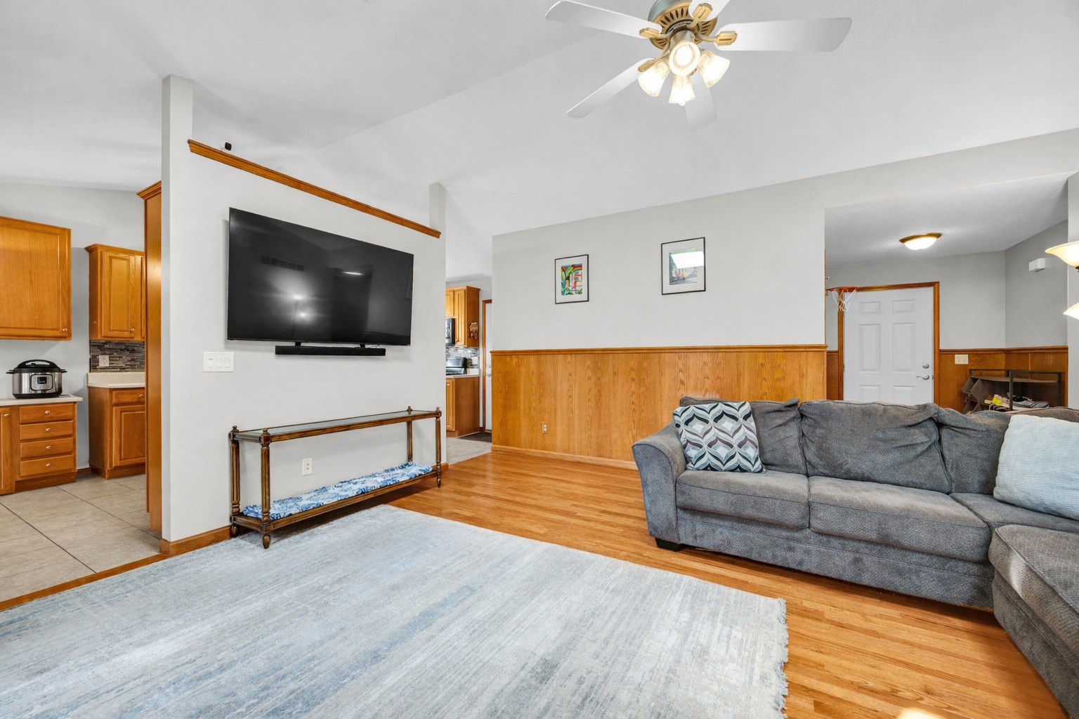 1829 Derek Drive Normal, IL 61761 - Photo 6 of 37 a living room with furniture and a flat screen tv