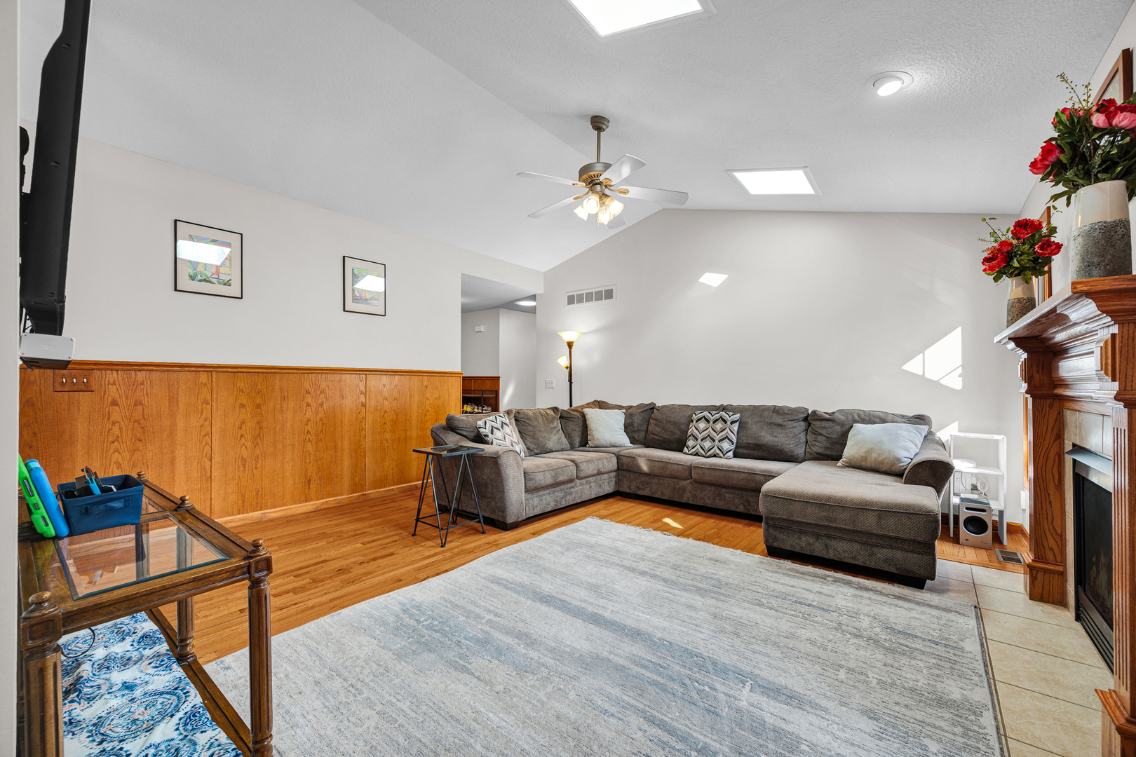 1829 Derek Drive Normal, IL 61761 - Photo 8 of 37 a living room with furniture flowerpot and wooden floor