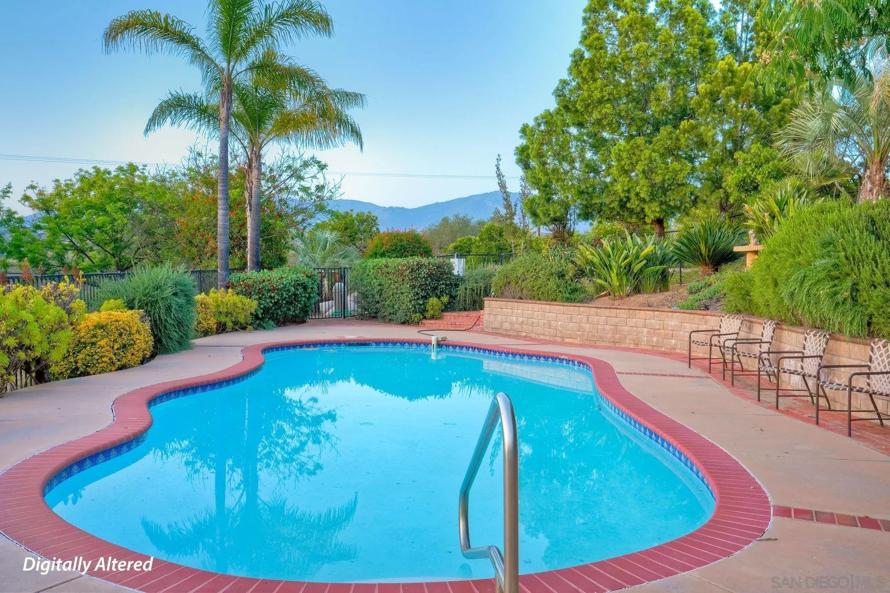 30458 Cool Valley Highlands Road Valley Center, CA 92082 - Photo 9 of 47 a view of a swimming pool with a yard