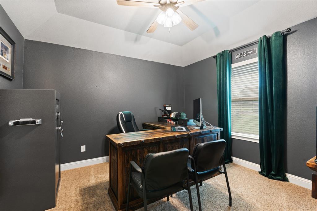 121 Treys Way Godley, TX 76044 - Photo 23 of 32 a bed room with a desk and chair