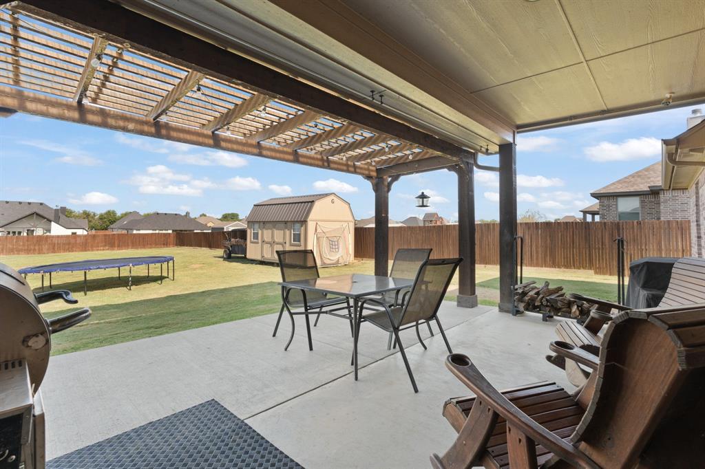 121 Treys Way Godley, TX 76044 - Photo 24 of 32 a view of a dining room with furniture window and outside view