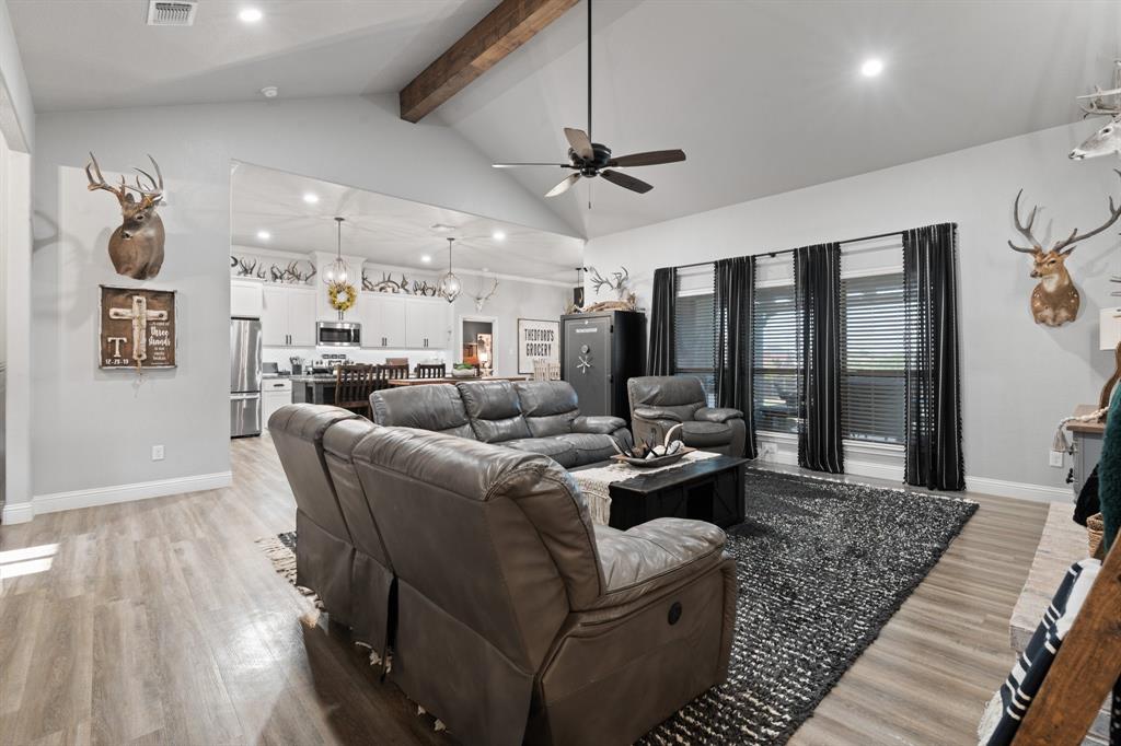 121 Treys Way Godley, TX 76044 - Photo 6 of 32 a living room with furniture and wooden floor