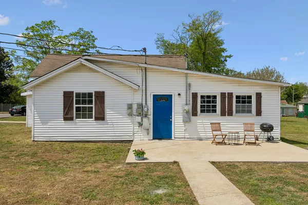 a view of house with outdoor space