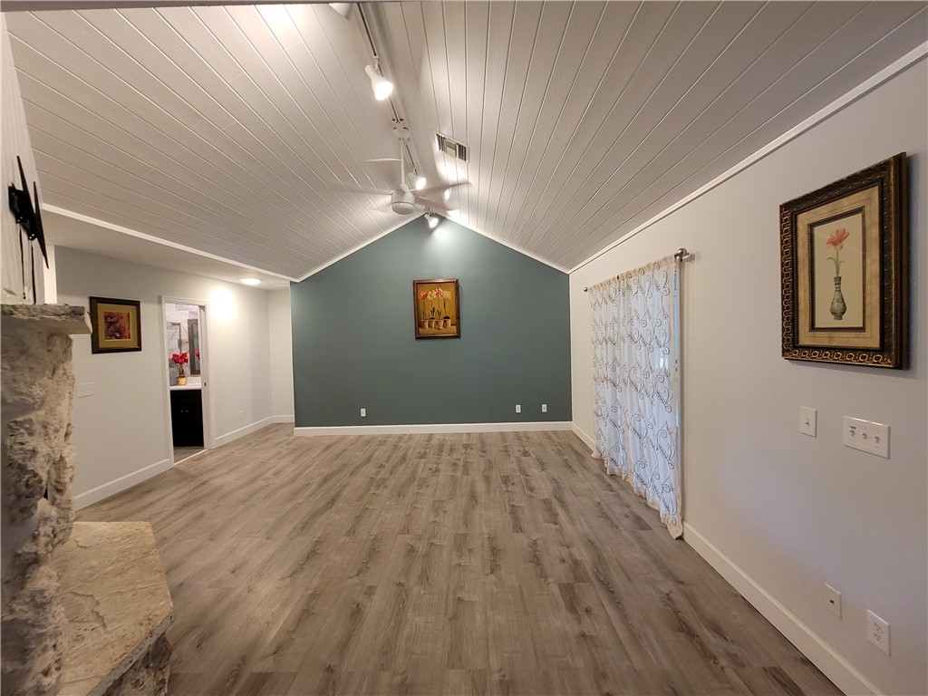 6515 5th Street Vero Beach, FL 32968 - Photo 16 of 36 a view of empty room with wooden floor