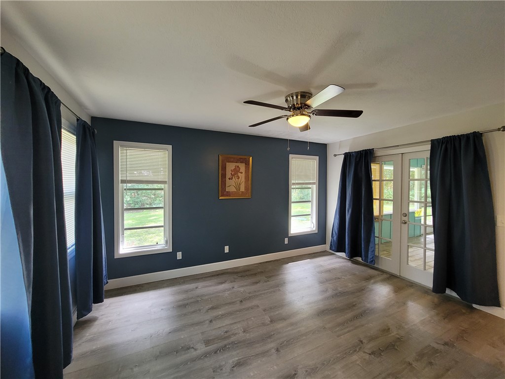 6515 5th Street Vero Beach, FL 32968 - Photo 20 of 36 a view of an empty room with a window and a kitchen