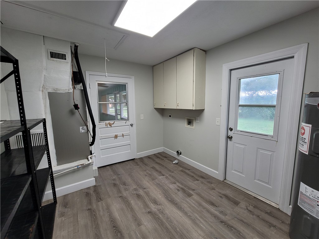 6515 5th Street Vero Beach, FL 32968 - Photo 32 of 36 a view of an empty room with wooden floor and a window