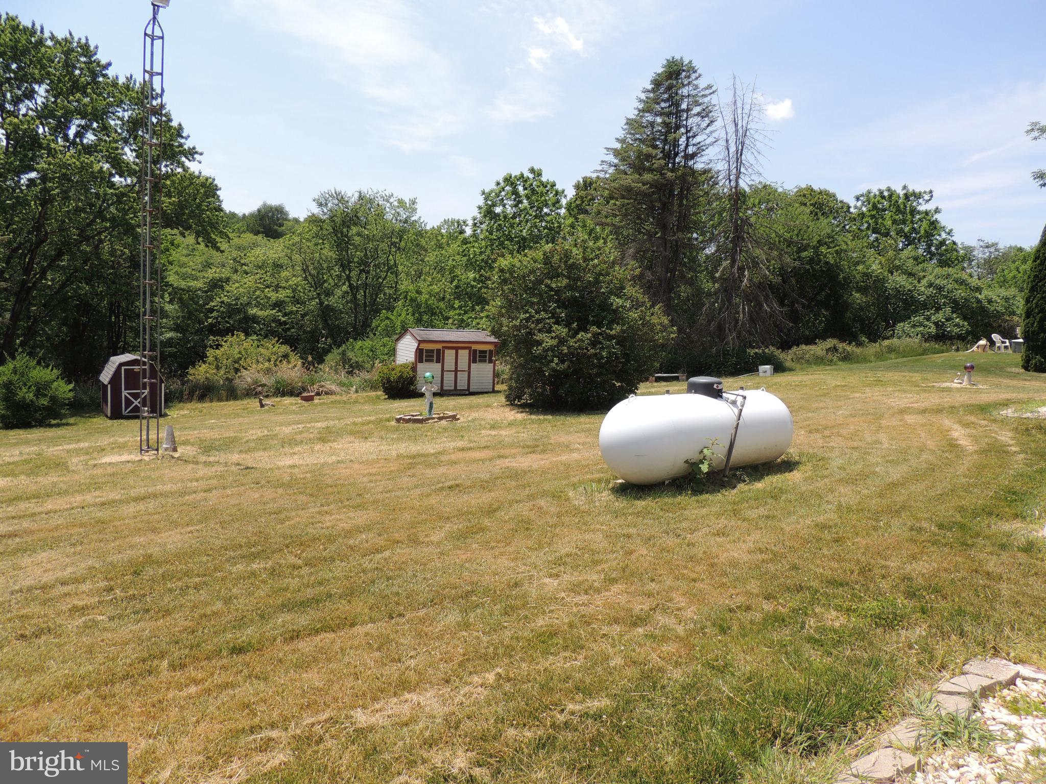 9 Washington Road New Freedom, PA 17349 - Photo 7 of 40 More of the rear yard and owned propane tank