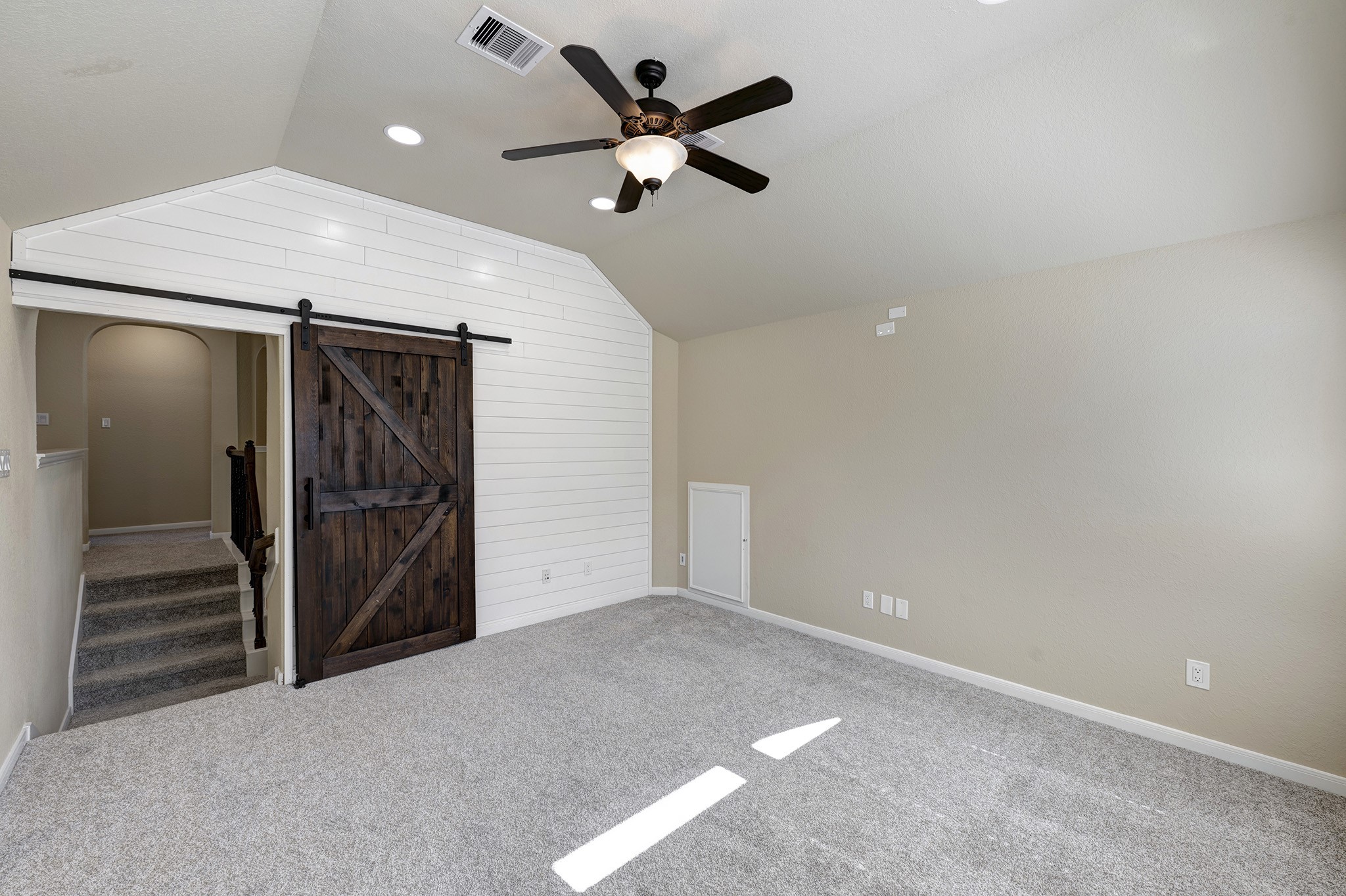 11 Red Wagon Drive Spring, TX 77389 - Photo 20 of 31 A sliding barn door on the game room helps control sound.