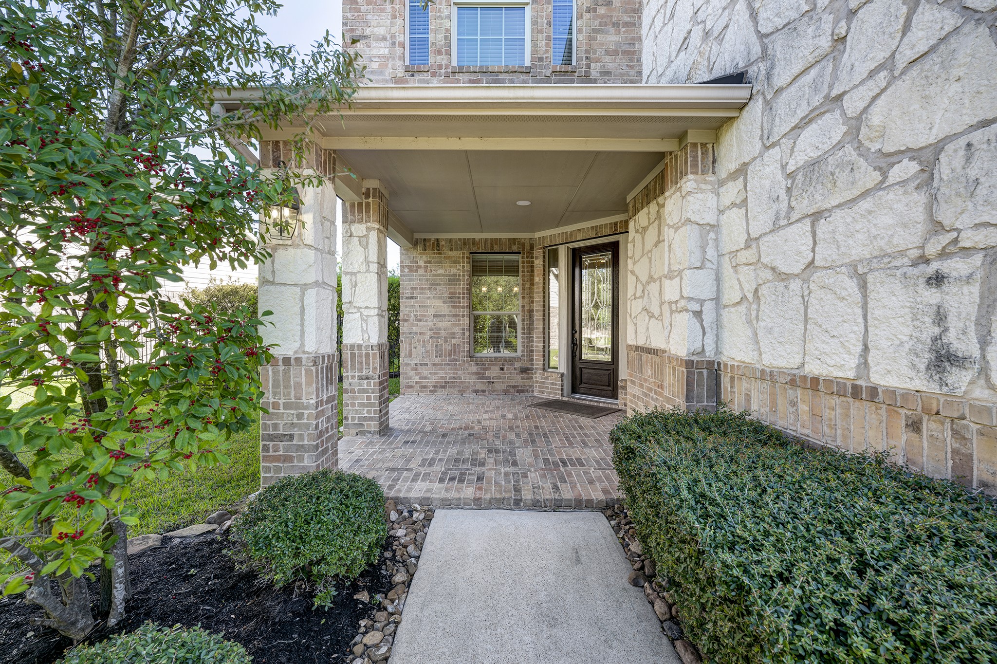 11 Red Wagon Drive Spring, TX 77389 - Photo 2 of 31 You are welcomed by a deep front porch with a brick floor.