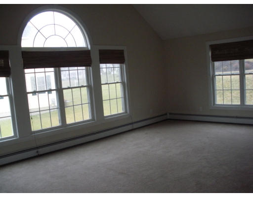 30 Brunelle Drive Rutland, MA 01543 - Photo 7 of 11 an empty room with a window