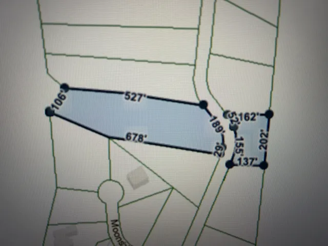 a bathroom with a mirror and a shower