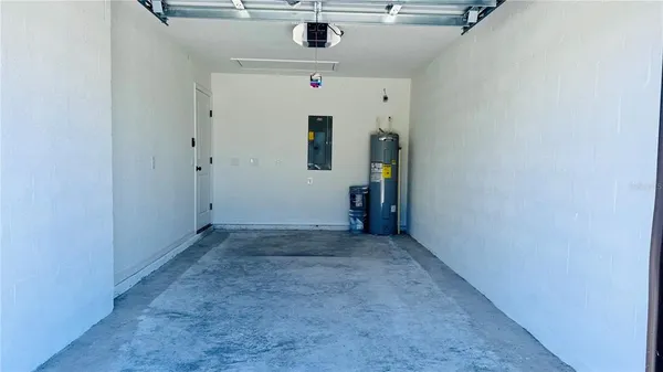 an empty room with entrance and door
