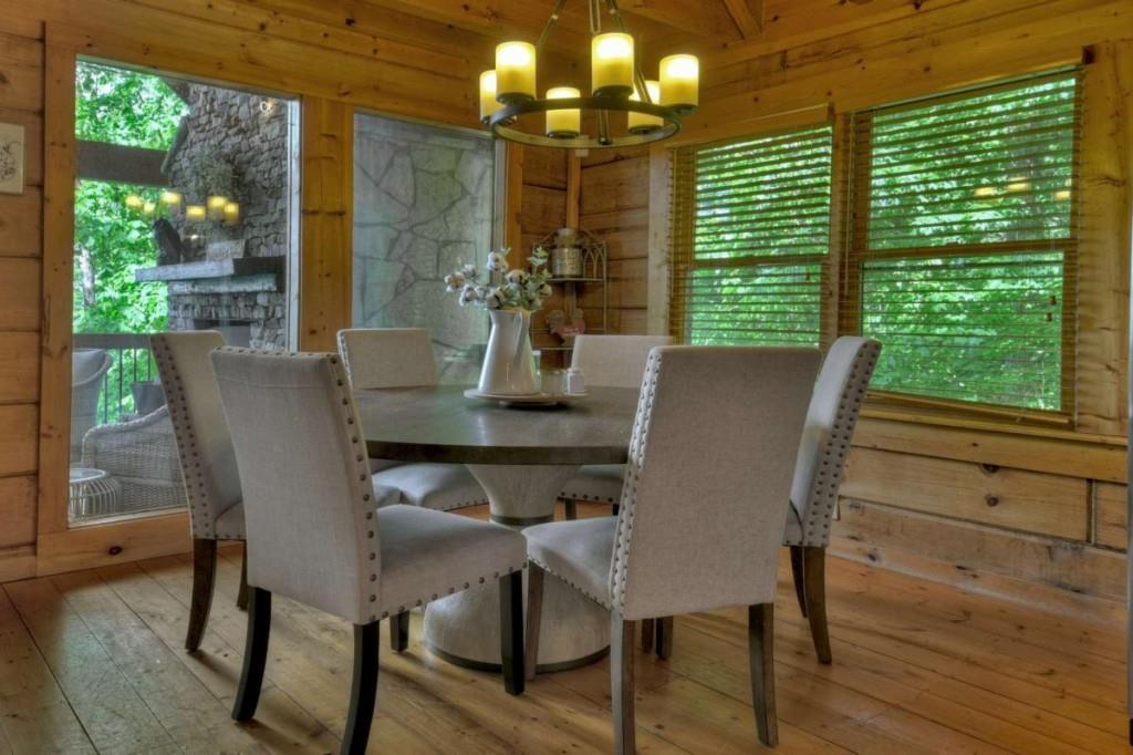 181 Ridge Circle Blue Ridge, GA 30513 - Photo 16 of 59 a view of a dining room with furniture window and outside view