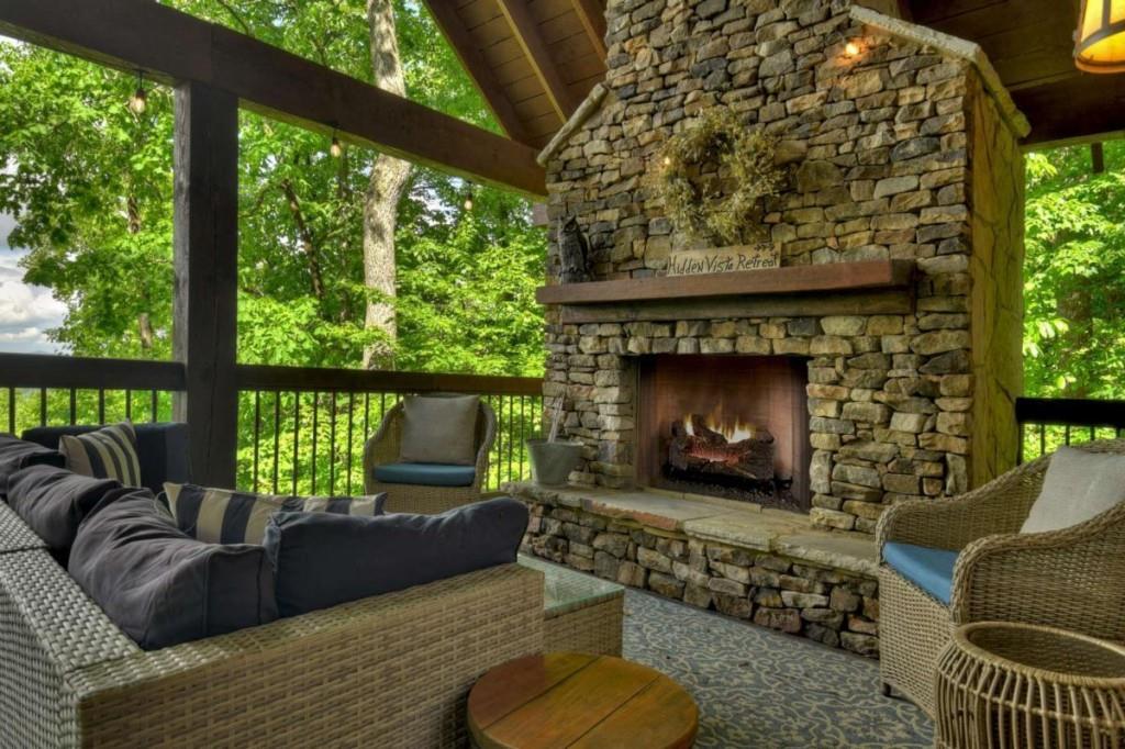 181 Ridge Circle Blue Ridge, GA 30513 - Photo 18 of 59 a living room with furniture and a fireplace