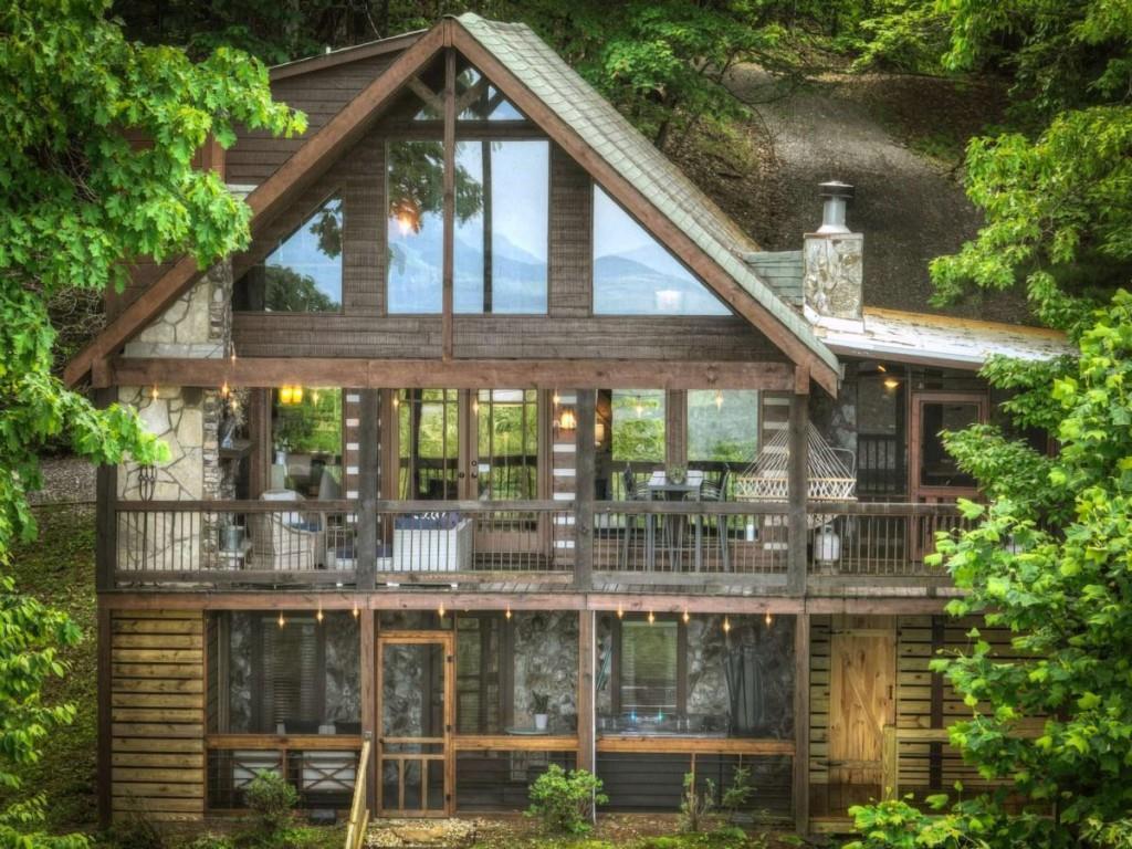 181 Ridge Circle Blue Ridge, GA 30513 - Photo 57 of 59 a front view of a house with a lake view