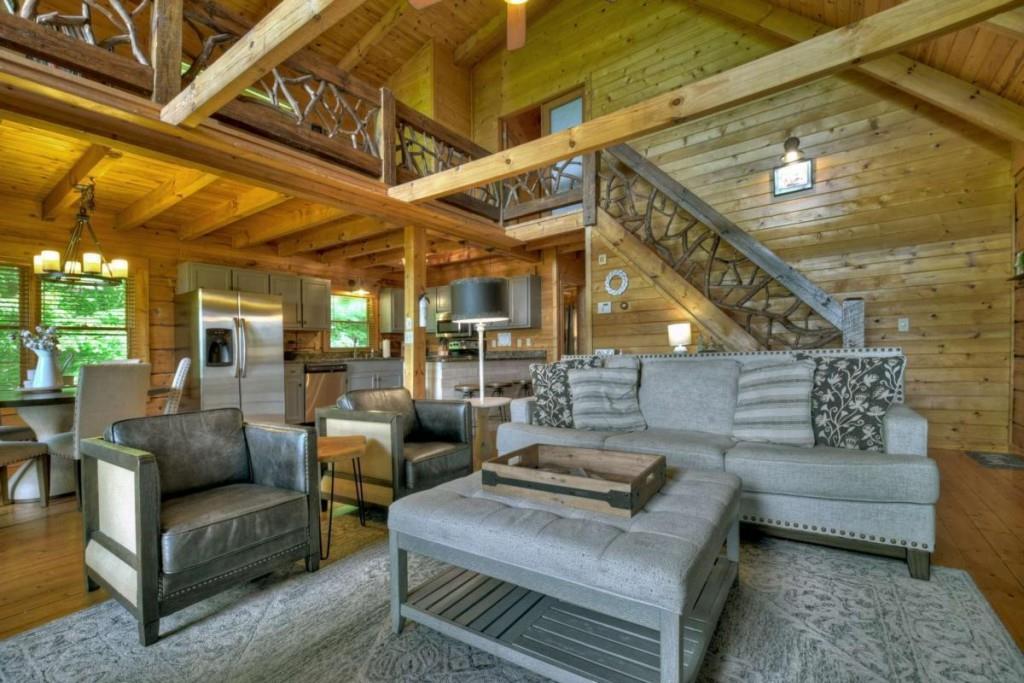 181 Ridge Circle Blue Ridge, GA 30513 - Photo 10 of 59 a living room with furniture and a clock