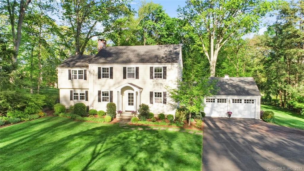 245 North Cedar Road Fairfield, CT 06824 - Photo 1 of 1 a front view of a house with garden