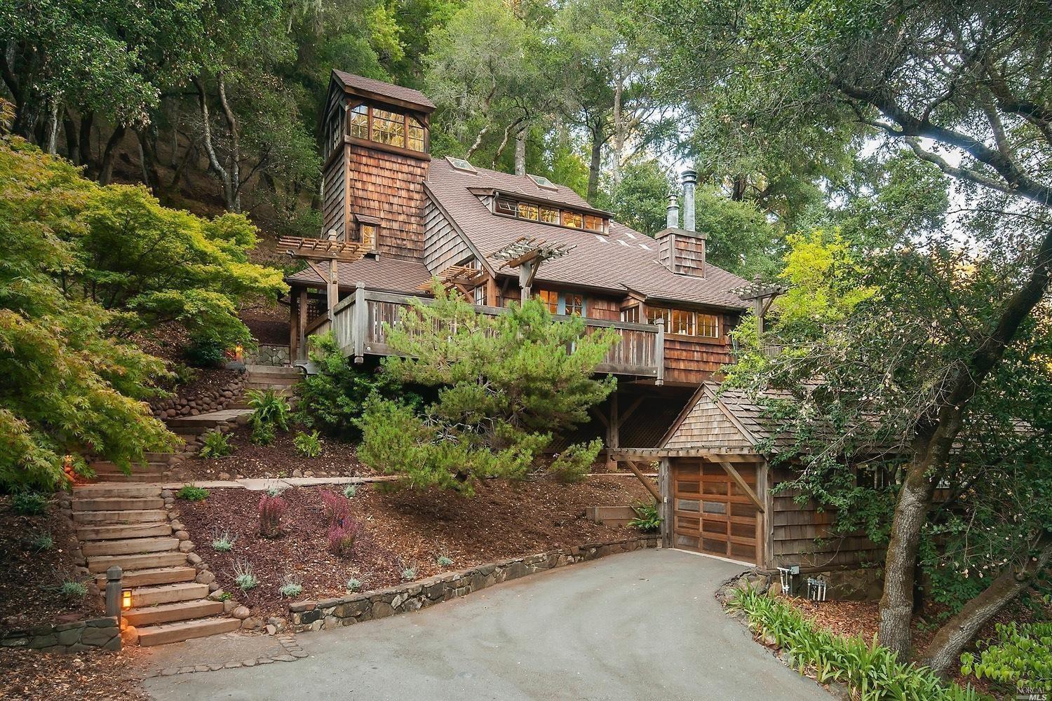 6700 Lucas Valley Road Nicasio, CA 94946 - Photo 1 of 1 This beautiful custom built home is nestled in the natural setting in harmony with it's surroundings. To the right is the detached 2 car tandem garage with doors and driveway on each side.