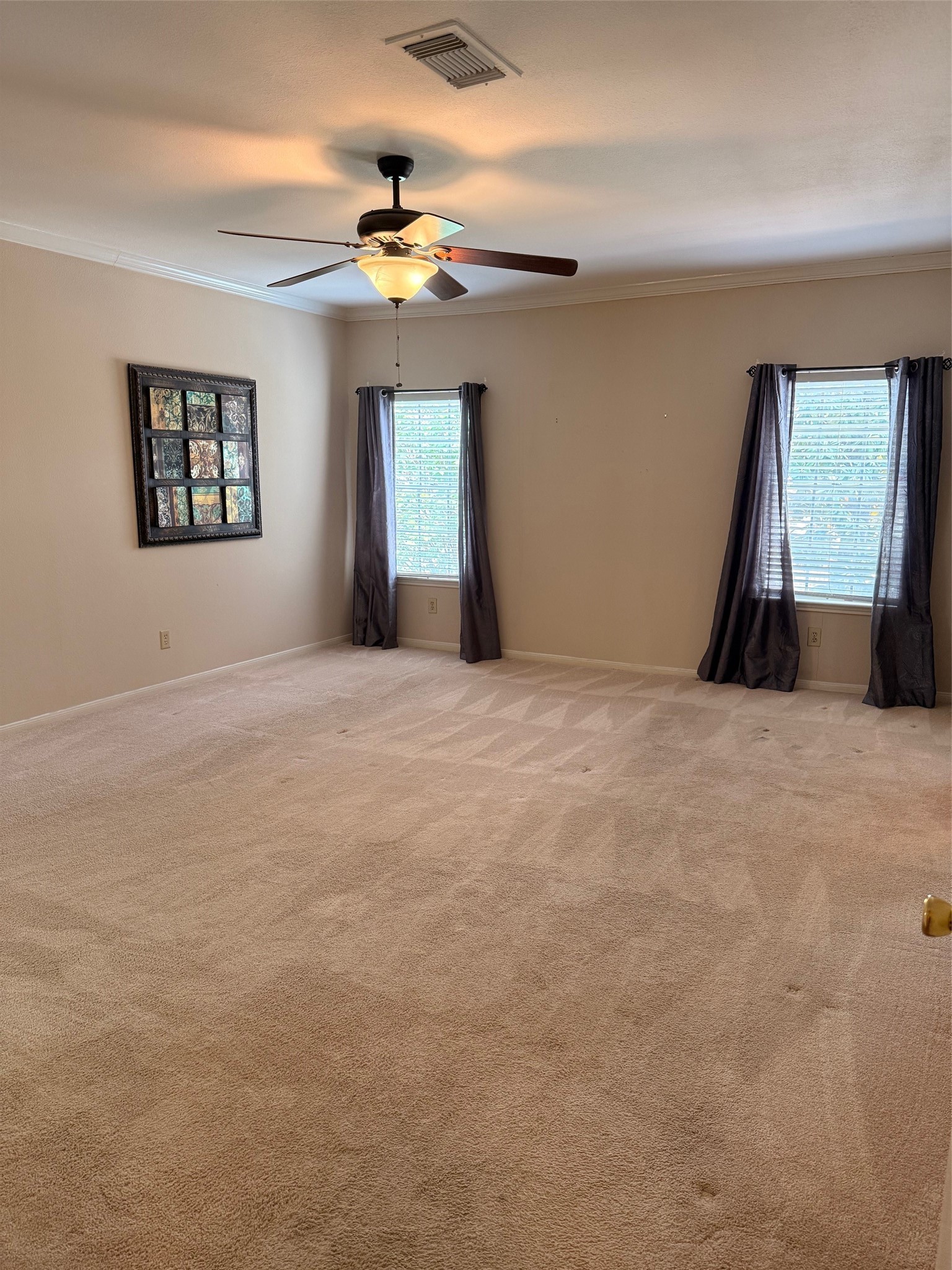 4001 Tanglewilde Street, Unit 811 Houston, TX 77063 - Photo 13 of 38 a view of an empty room with a chandelier fan
