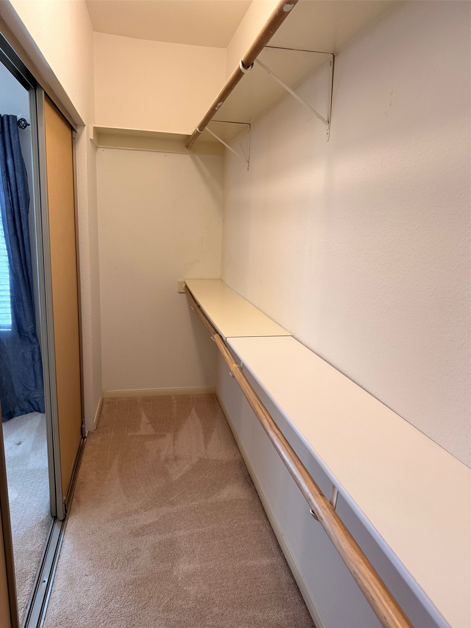 4001 Tanglewilde Street, Unit 811 Houston, TX 77063 - Photo 14 of 38 a view of closet with wooden floor