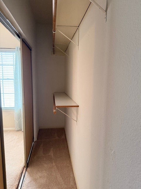 4001 Tanglewilde Street, Unit 811 Houston, TX 77063 - Photo 26 of 38 a view of a hallway with a white walls