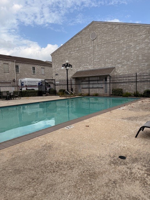 4001 Tanglewilde Street, Unit 811 Houston, TX 77063 - Photo 32 of 38 a view of a terrace with yard
