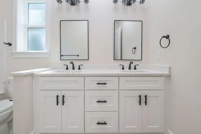 a view of a balcony with wooden floor