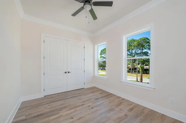 a view of an empty room with white walls