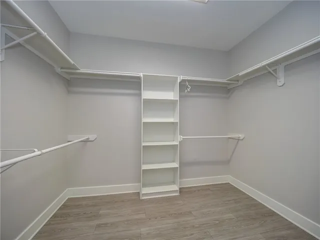a view of an empty walk in closet