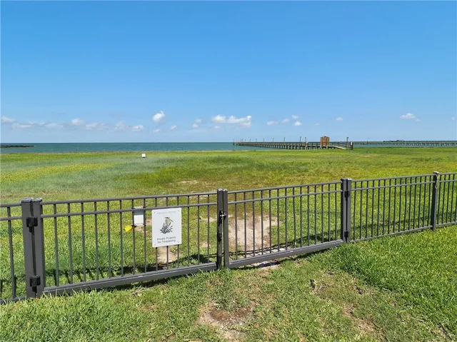 a view of a pathway with a lake view