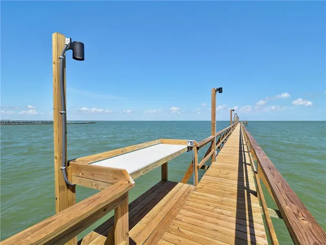 a view of a balcony with ocean