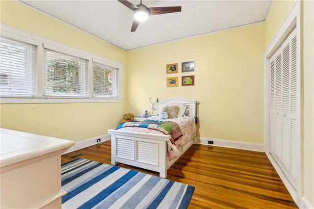 a bed room with a bed and a window