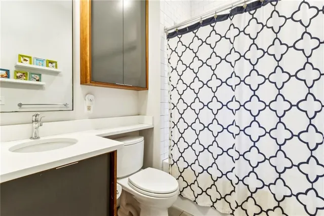 a bathroom with a sink and a toilet