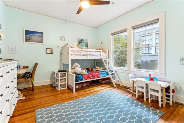 a living room filled with furniture and a table