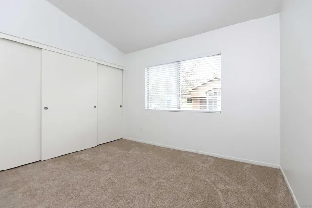 an empty room with closet