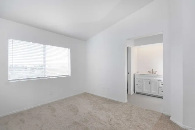 a bathroom with a sink and vanity