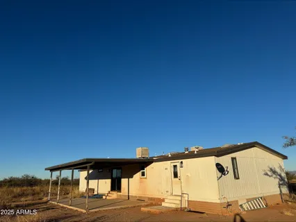 a view of a big room with a view of roof