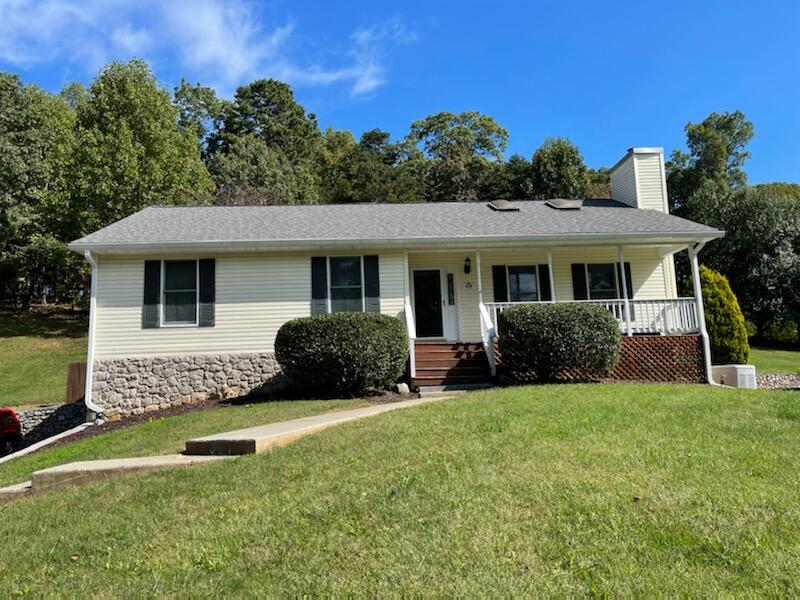 458 Scalybark Drive Blue Ridge, VA 24064 - Photo 1 of 2 a front view of a house with a yard