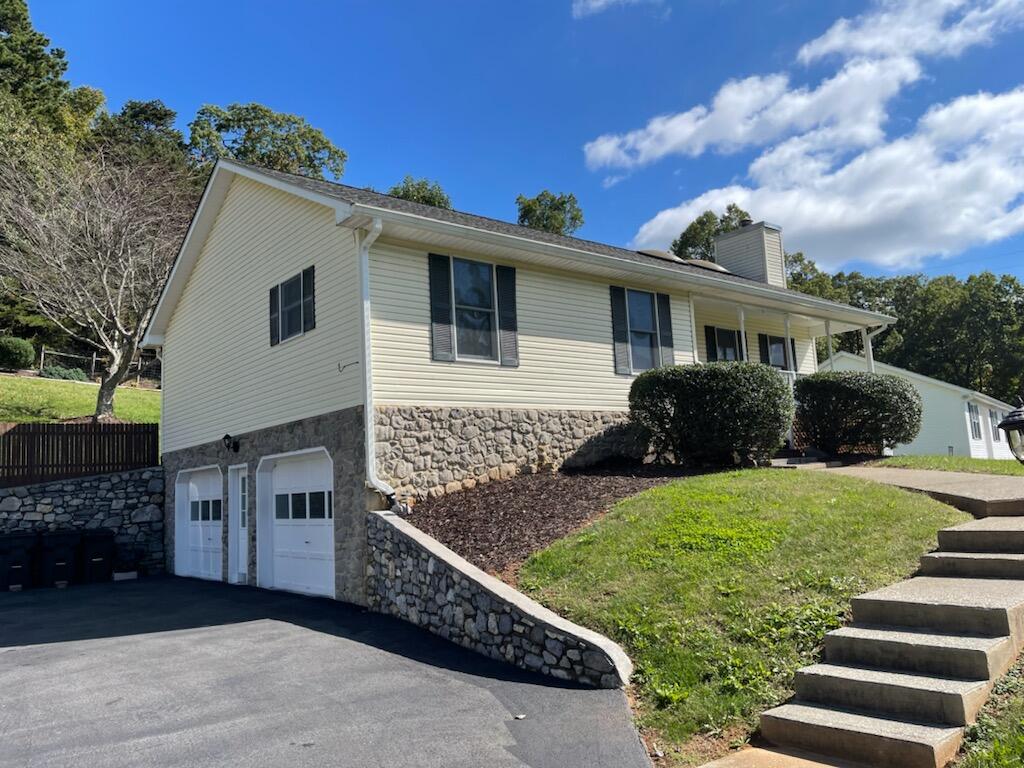 458 Scalybark Drive Blue Ridge, VA 24064 - Photo 2 of 2 a front view of a house with garden